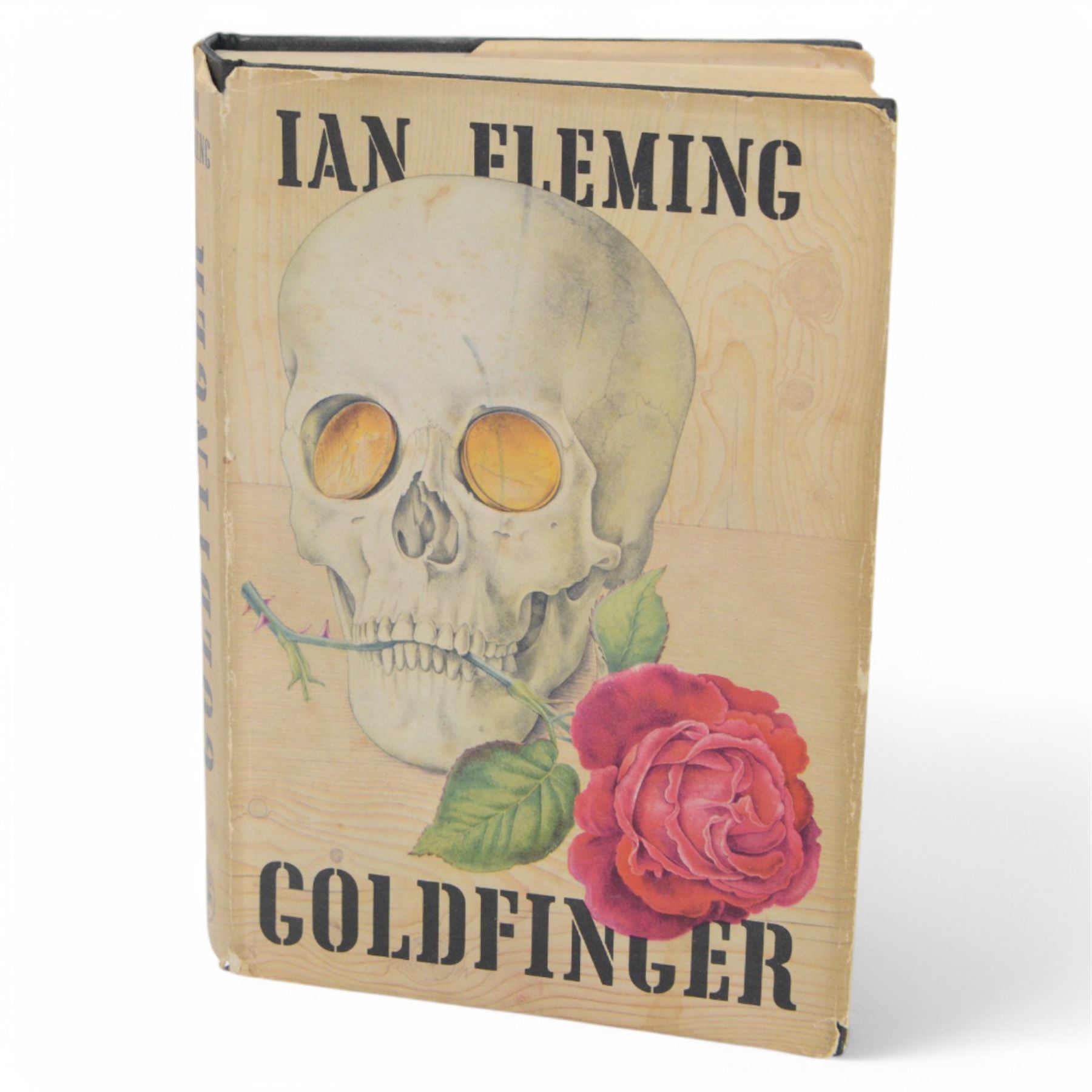 Fleming Ian: Dr. No first edition 1958, pub. Jonathan Cape London, with plain black cover and dustjacket, together with Goldfinger first edition, second impression 1959, pub. Jonathan Cape London, with embossed black cloth/gilt cover and dustjacket (2)