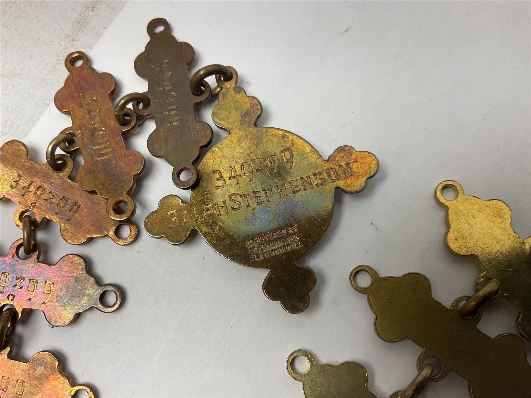 Four St John's silver fobs, together with two silver Directors Ambulance shield fobs and two other St Johns items 
