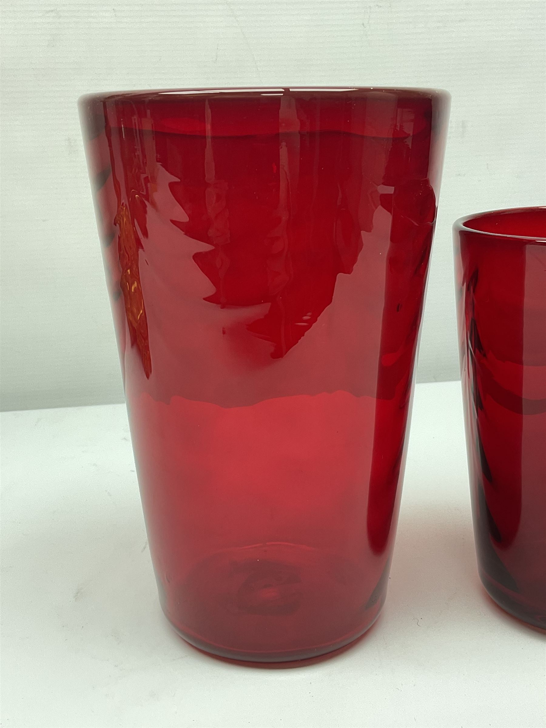 Marriott Powell for Whitefriars, Optic Wave red glass bucket vase, together with similar smaller example, tallest H20cm