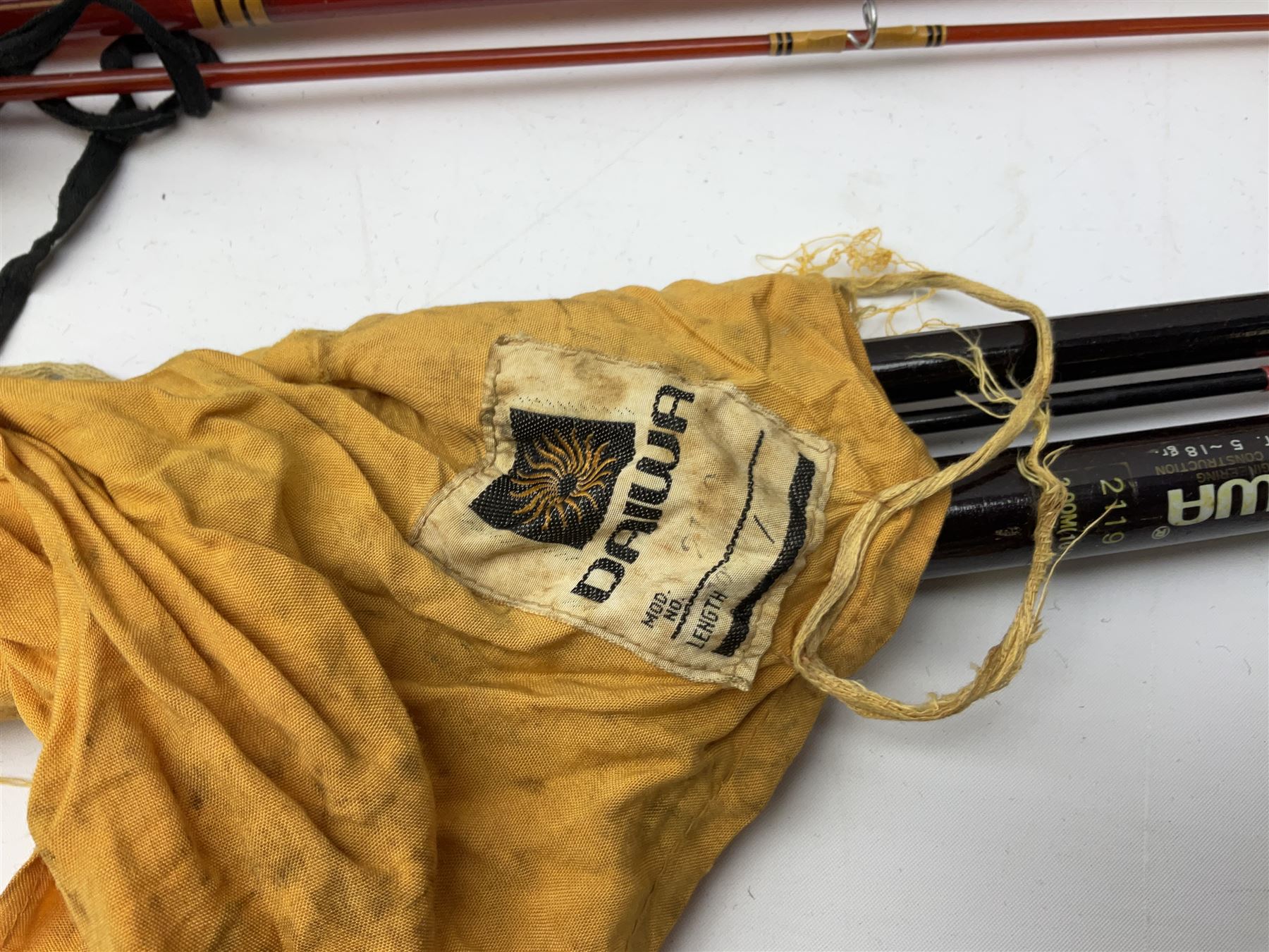 Quantity of fly and sea fishing rods and accessories, to include Shakespeare Boat 210 rod, Daiwa rod and others, and Guang Zhao FLD9000 course fishing reel, Beachmaster 7000FD, Rimfly II amd Penn Super Mariner, tackle etc