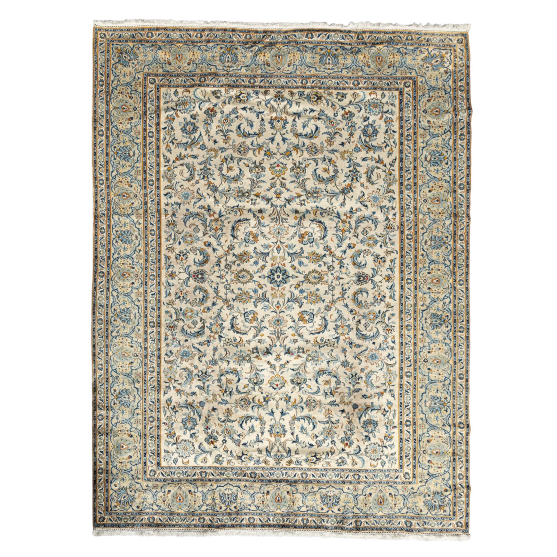 Central Persian Kashan hand-knotted carpet, ivory field profusely decorated with an all-over scrolling vine, palmette, and lotus design in shades of soft blue, pale gold, and green within floral borders