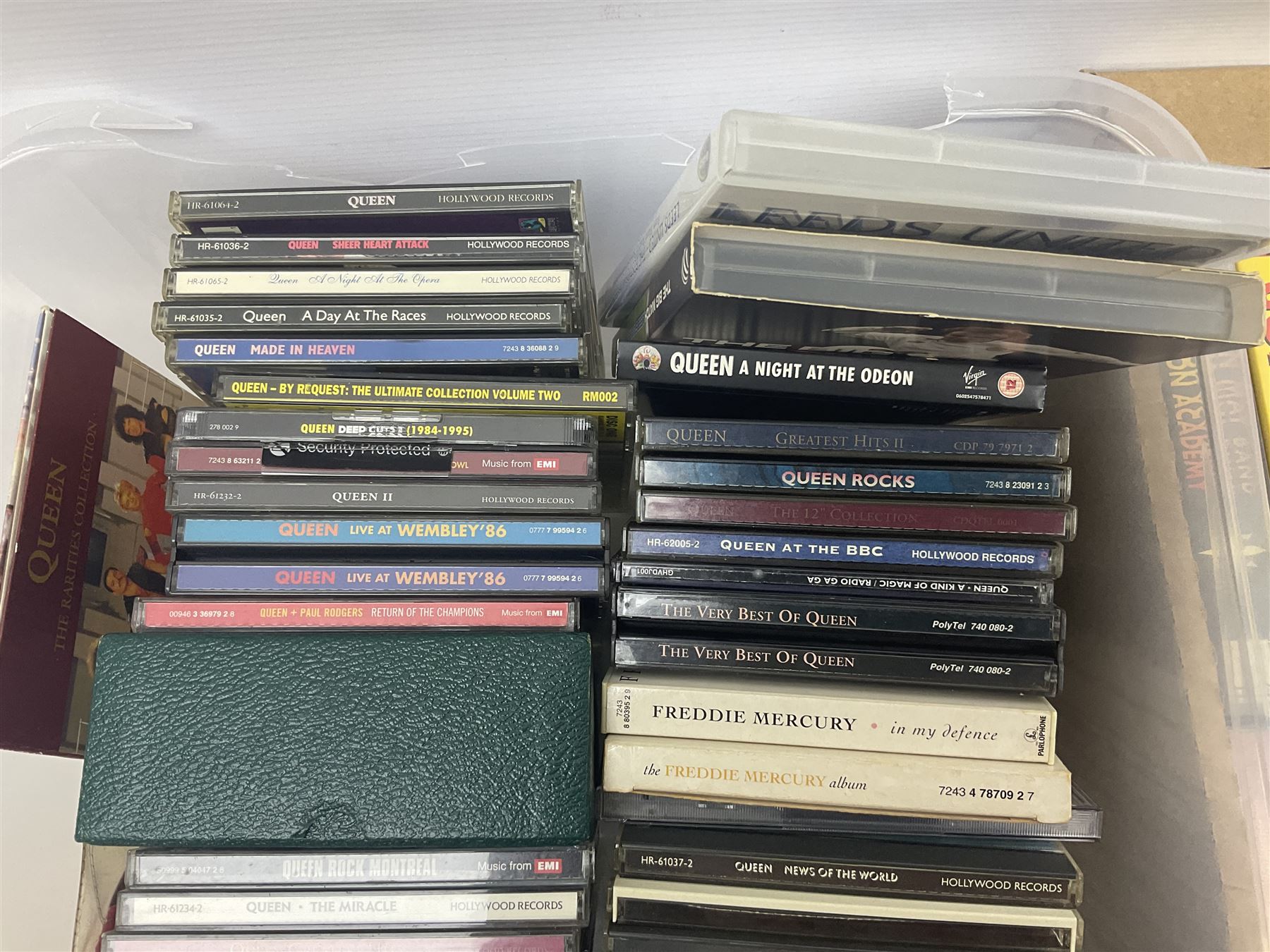 Large collection of VHS tapes, DVDS, CDs to include Queen, James Bond 007, Batman etc, in three boxes