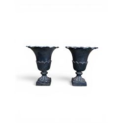 Pair of Victorian large scale cast iron garden urns, flared petal shaped rim with tapering...