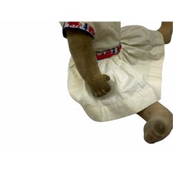 1920s Chad Valley 'Bambina' doll, the pressed felt head with applied hair, side glancing inset glass eyes, painted facial features and velvet jointed body, Hygenic and Bambina labels to the feet H46cm