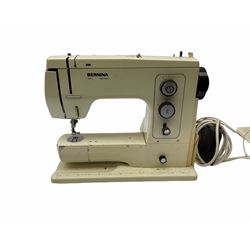 Three Bernina 801 model sewing machines, (one for parts, the other two examples untested), together with a large bag of thread. 