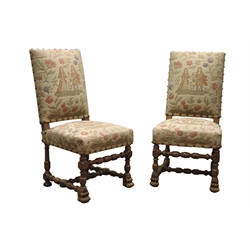  Pair Victorian walnut framed hall chairs, with brass nailed upholstered needlework back and seats, turned supports with bobbin stretchers and claw feet (2)  
