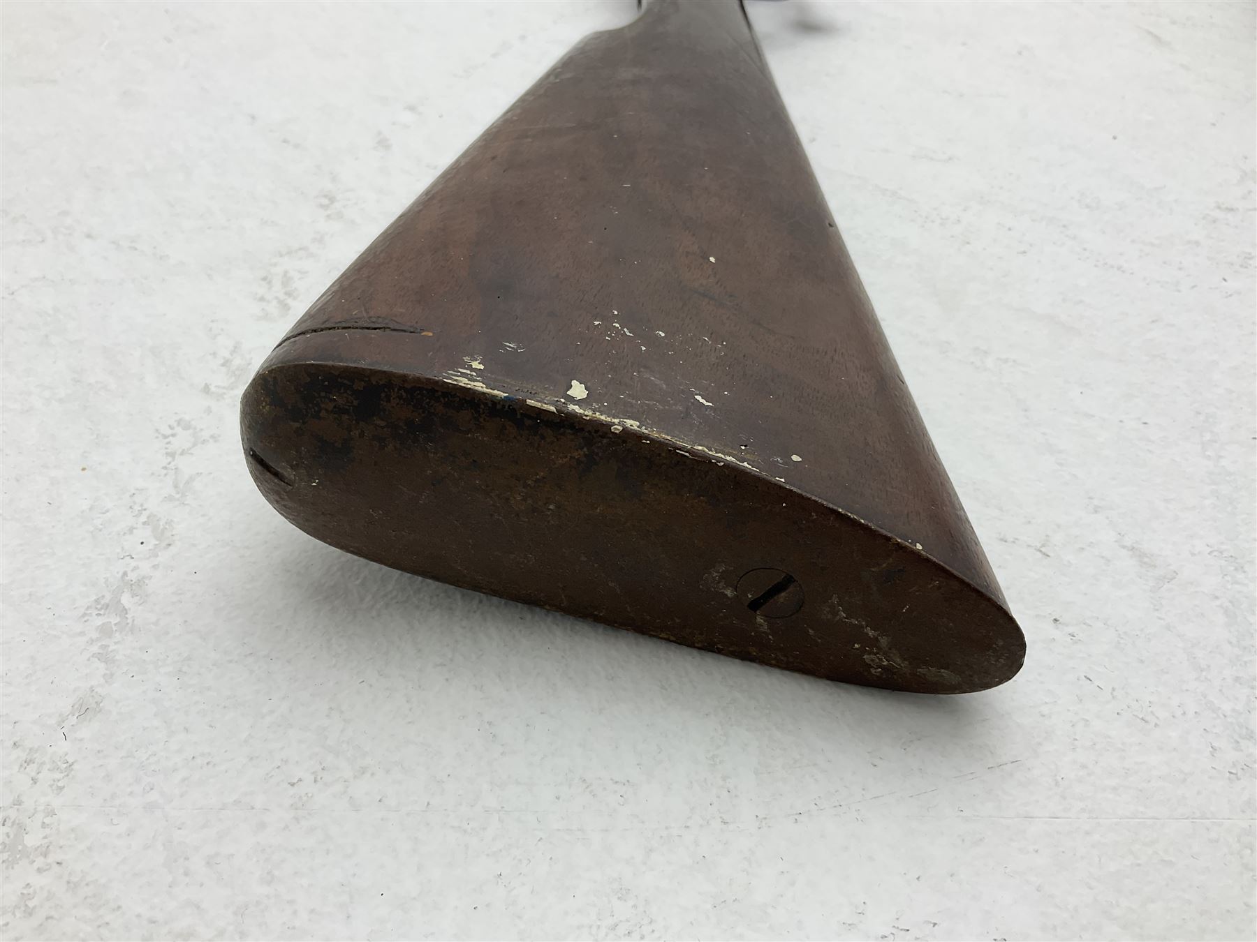 WW1 Lee Enfield SMLE .303 bolt action rifle with 63.5cm barrel and magazine; No.20934; L112cm overall; home deactivated by welding down bolt and end of barrel so requires re-deactivation to modern standards; and 19th century 12-bore double barrel hammer shotgun with 65cm cut-down barrels, non-rebounding hammers and under-lever opening, the lock-plate indistinctly inscribed G.T. Bartrant(?) L75cm overall; home deactivated by welding both barrels closed at breech so requires re-deactivation to modern standards (2) RFD ONLY 