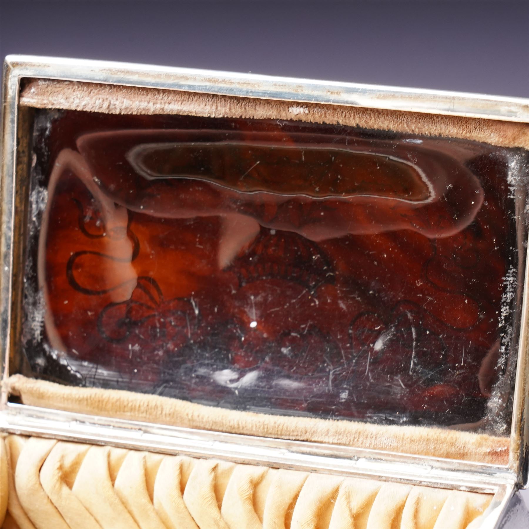 Edwardian silver rectangular trinket box with padded interior, the hinged cover inset with a tortoiseshell panel with pique decoration and on shaped supports W12cm Birmingham 1910 Maker Henry Matthews