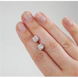 Pair of 18ct white gold round brilliant cut diamond stud earrings, hallmarked, total diamond weight approx 2.05 carat