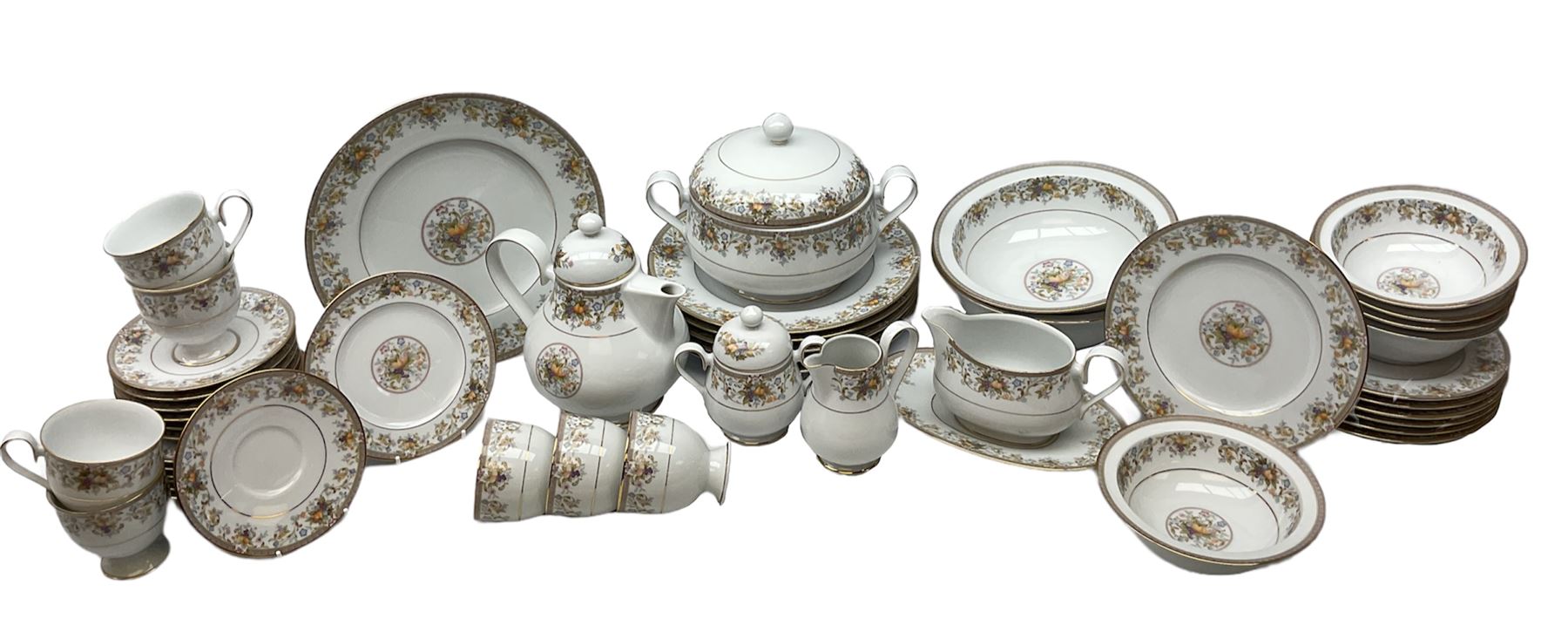 Noritake Ireland tea and dinner wears, comprising of teapot, milk jug, covered sucrier, seven teacups and saucers, seven dessert plates, six dinner plates, seven side plates, five bowls two serving dishes, one lidded tureen and a gravy boat and dish