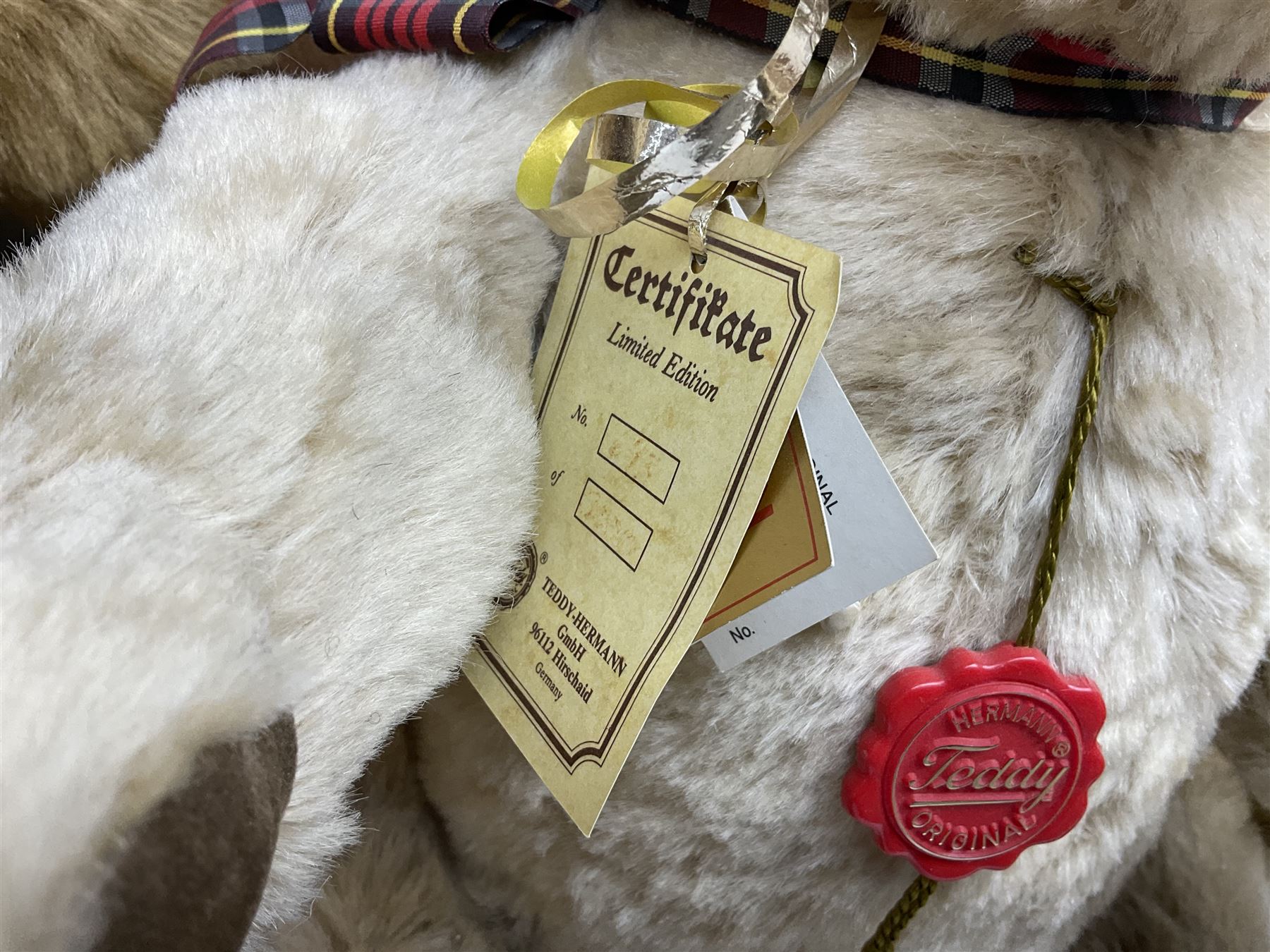 Four modern limited edition teddy bears - two by Russ Berrie, 'Hanley' H56cm and 'Barrymore'; Hermann with growler mechanism; and Northumberland Bearcraft 'Seaton' No.24/50 (4)