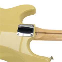Squier by Fender Pro Tone Series Stratocaster electric guitar, in Olympic White finish, made in Korea serial no. 7034880, contained within a Fender soft case, guitar L98cm