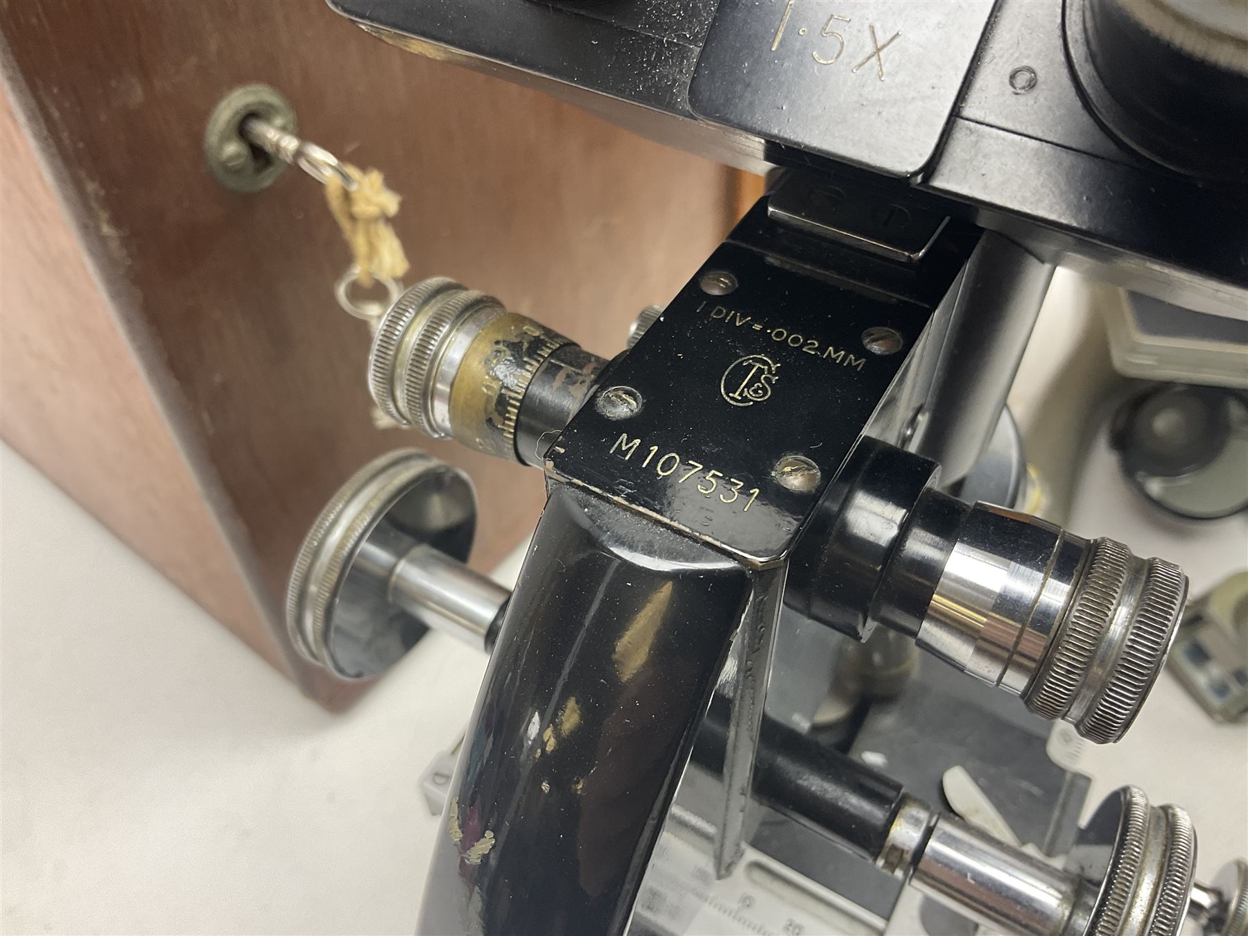 Four microscopes, including Cooke, Troughton & Simms no M467926, W Watson & Sons no 114758, W & J George & Beck Ltd no 36649 and one other 