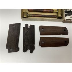 Six pairs of revolver grips;  pair of Lightwood & Son Ltd powder/shot measures in original box; and boxed Colt hammer shroud 