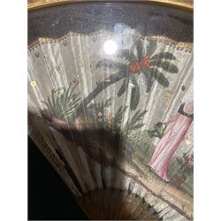 18th century fan, the horn sticks and guard with silvered and gilded decoration, the silk leaf painted in strong colours with a young couple in a garden setting, within a border of gold coloured sequins, framed and glazed, overall H35cm L55cm
Provenance: From the Estate of the late Dowager Lady St Oswald