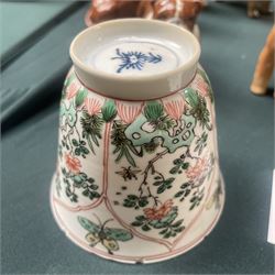 Three Chinese famille verte examples, approximately Yongzheng period, to include two teabowls and two saucers, each decorated with flowers and butterflies, two with sacred fungus mark within double rings, the teabowl with lotus mark, the other indistinct - possibly a Wan mark within lozenge (4)