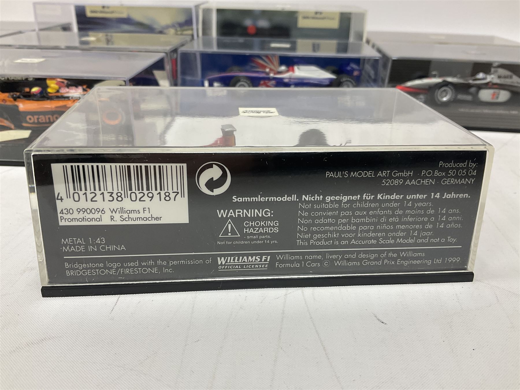 Pauls Model Art Minichamps Formula - ten 1:43 scale die-cast models of racing cars in plastic display cases (10)