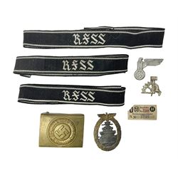 Three Reichsfuhrer 'SS' cuff titles; RZM 'SS' paper tag; German Water Police belt buckle; Destroyers badge marked RKS verso; N.S.B.O. lapel badge; and incomplete party eagle cap badge (8)