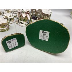 Five Lilliput Lane Illuminated Cottages, comprising Christmas is Coming, with box and deed, Christmas at Mol's, with box and deed, Christmas in Canterbury, with box and deed, Christmas Lights at Sweet Delights and The Three Kings, with box and deeds, together with twelve other Lilliput lanes, to include The First Noel, with box and deed, Winters Moonlight, Yuletide treats, with box and deed etc (17)