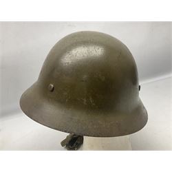 WW2 Japanese Army type 92 steel helmet with infantry star badge to centre, webbing liner and chin strap