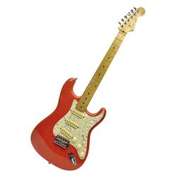 Japanese Squier Fender 'Hank Marvin' Stratocaster electric guitar, c1992, in Fiesta red with tremolo arm and facsimile signature decal; serial no.L037281, L98cm; in hard carrying case.