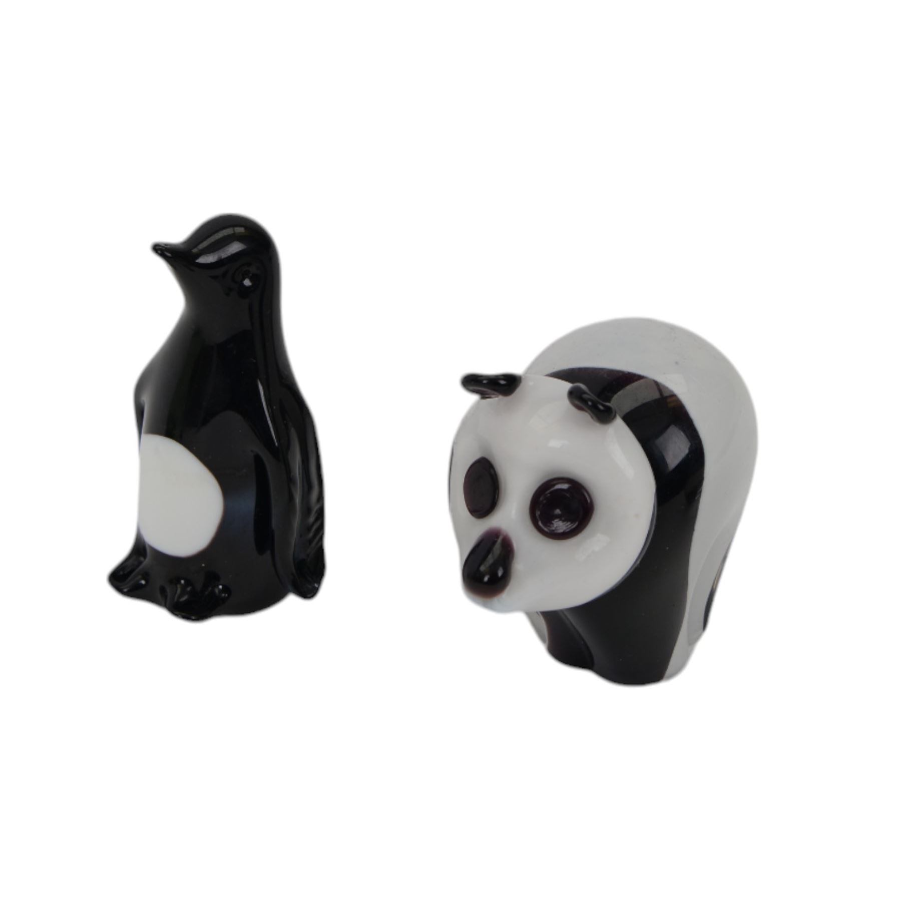 Glass dump with bubble inclusions, together with Wedgwood glass panda and three other glass animals 