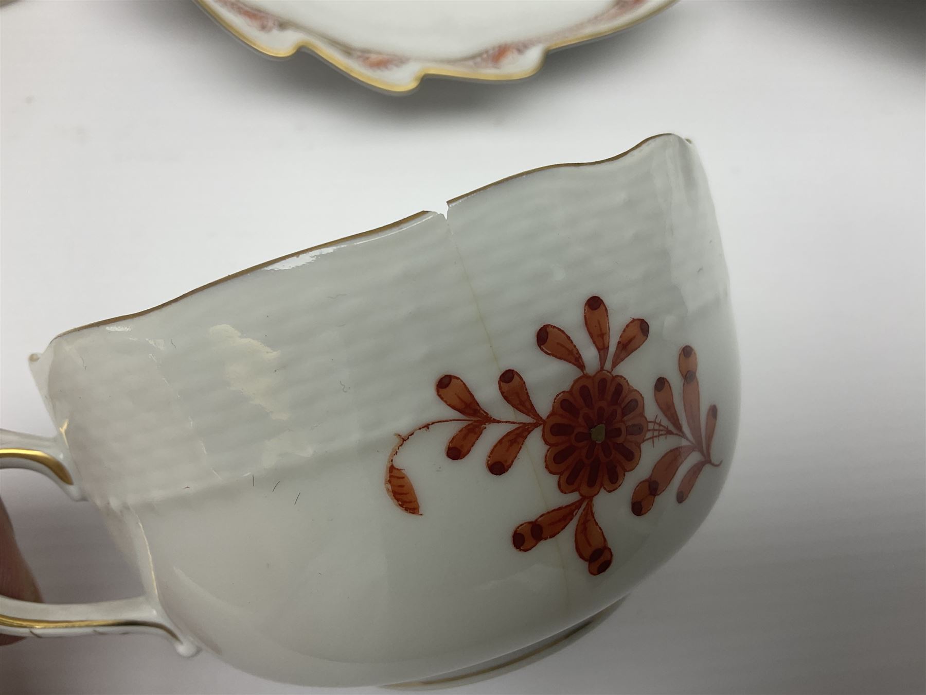 Herend Chinese Bouquet Rose pattern tea service comprising teapot, coffee pot, open sucrier, six cups and saucers, six tea plates, cream jug and stand, milk jug, two teabag holders, preserve pot, two leaf shaped dishes, four egg cups, salt & pepper pots, pair side plates and another plate