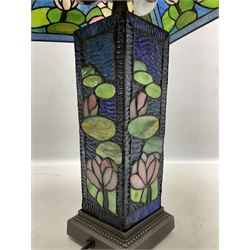 Tiffany Pond Lily style table lamp and shade with leaded panels of green, pink and rippled blue water effect ground, raised upon brushed metal base, H50cm