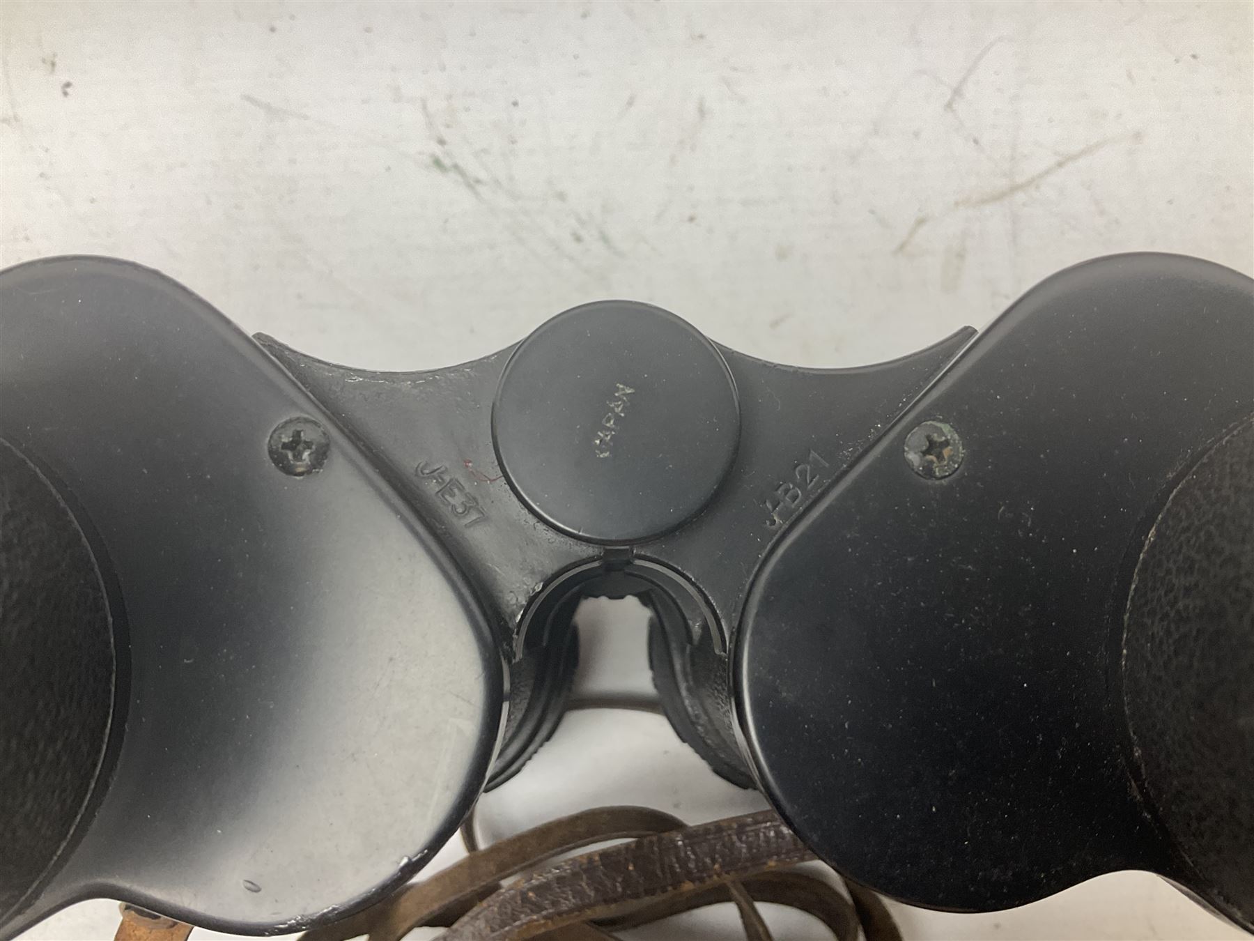 Nine cased pairs of binoculars to include Lieberman & Gortz 12x50, Frank Nipole 8x56, Uniscope, Hoya mark II 8x40, Porst 8x56 etc