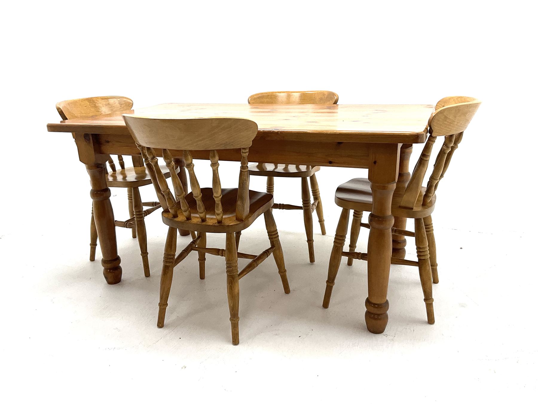 Pine farmhouse dining table and four spindle back chairs