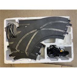Scalextric - Porsche Power Set; boxed; Subaru Competition Rally Set (track and controllers only); boxed; Formula 1 Racing Car Set; polystyrene box base only; together with large quantity of track in four boxes; and quantity of accessories including vehicles, part vehicles for spares or repair, fencing, bridge, spare controllers etc