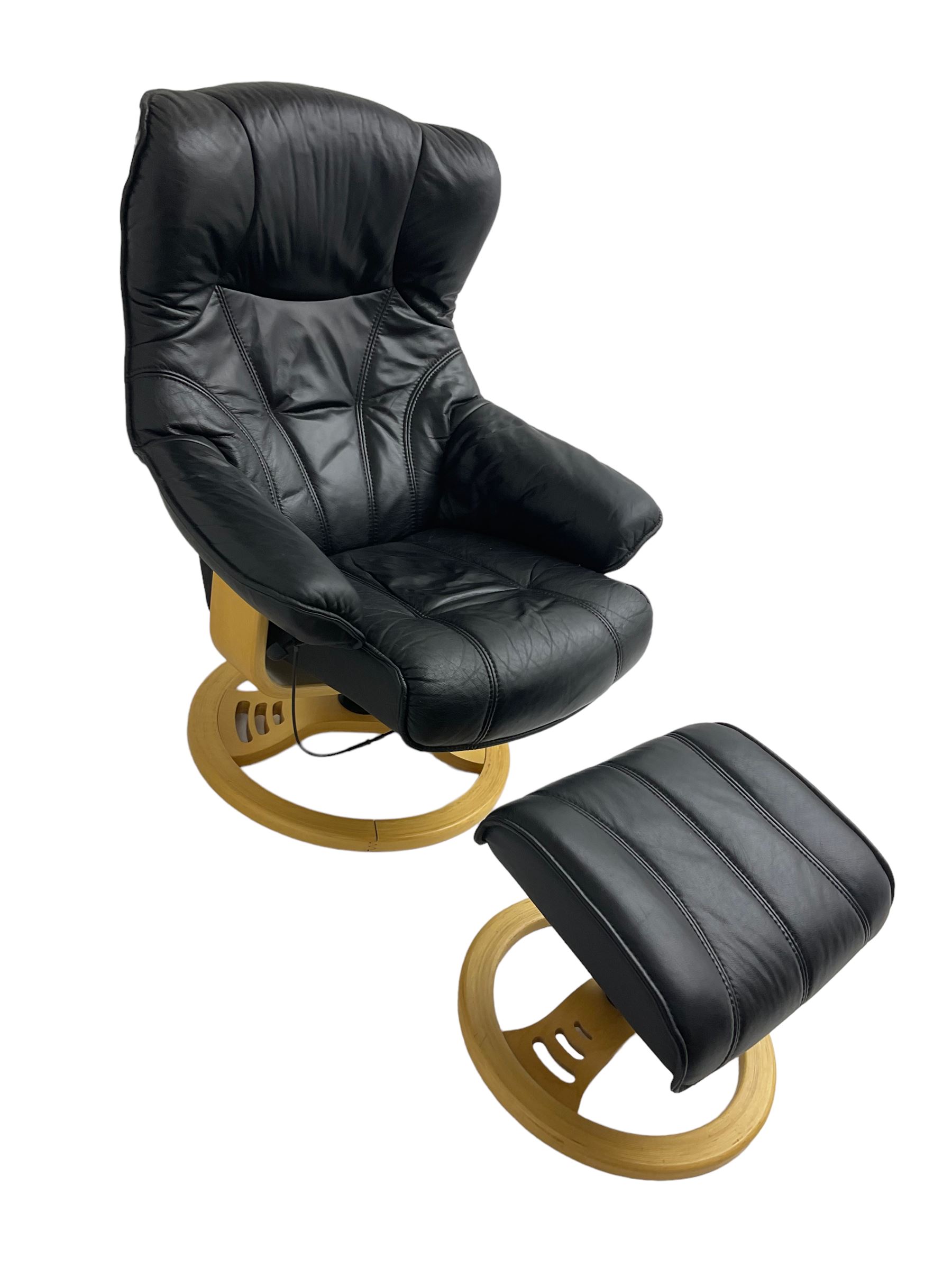 Anderssons of Sweden - mid-20th century design swivel armchair, upholstered black leather, raised on beech U-frame supports with circular base, together with matching footstool 