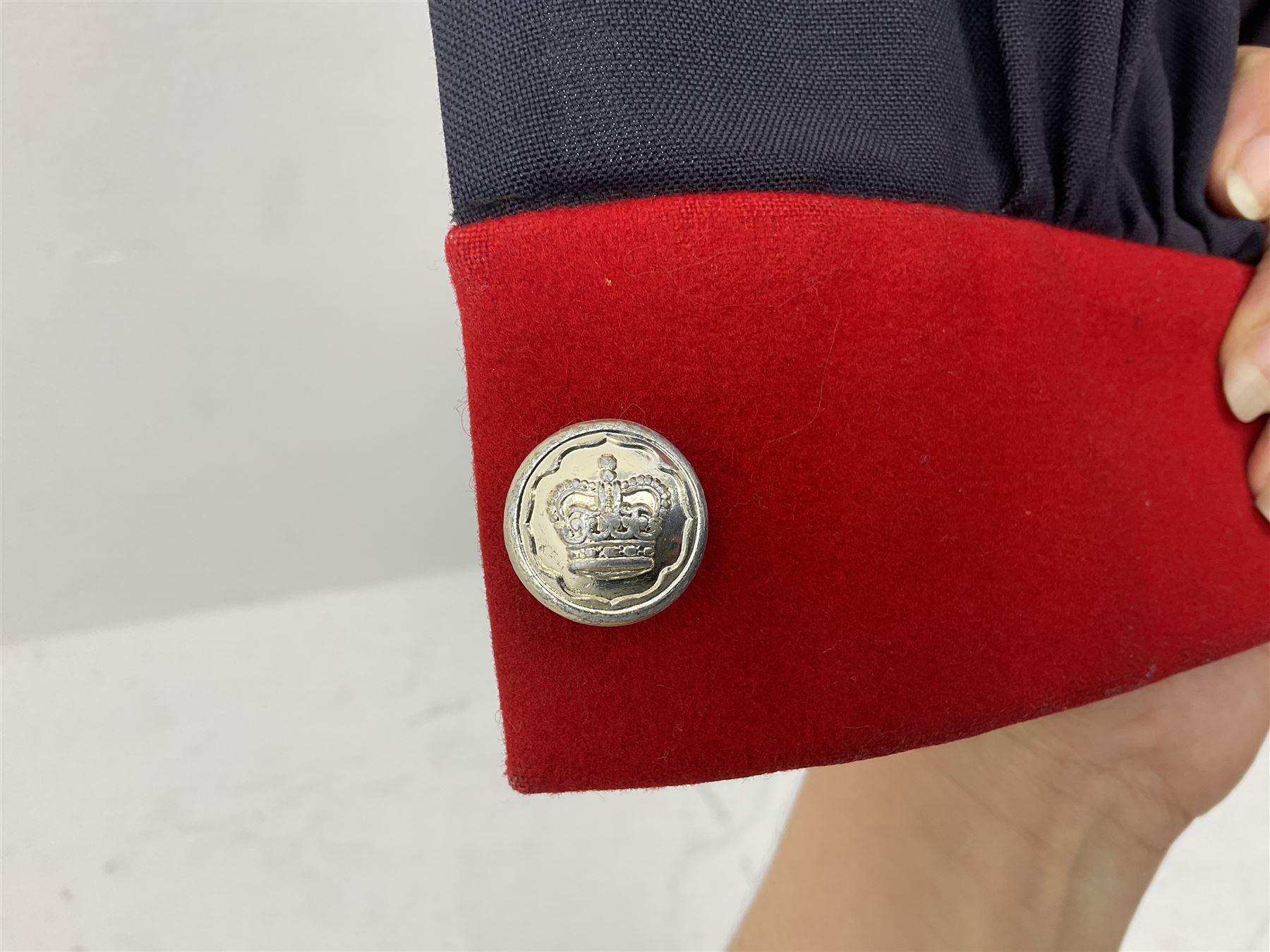 Elizabeth II Yeoman Warders (Beefeater) No.1 Undress blue uniform - comprising tunic bearing label Crown Military Uniforms H.M. Tower of London and bonnet by S. Patey (2) 