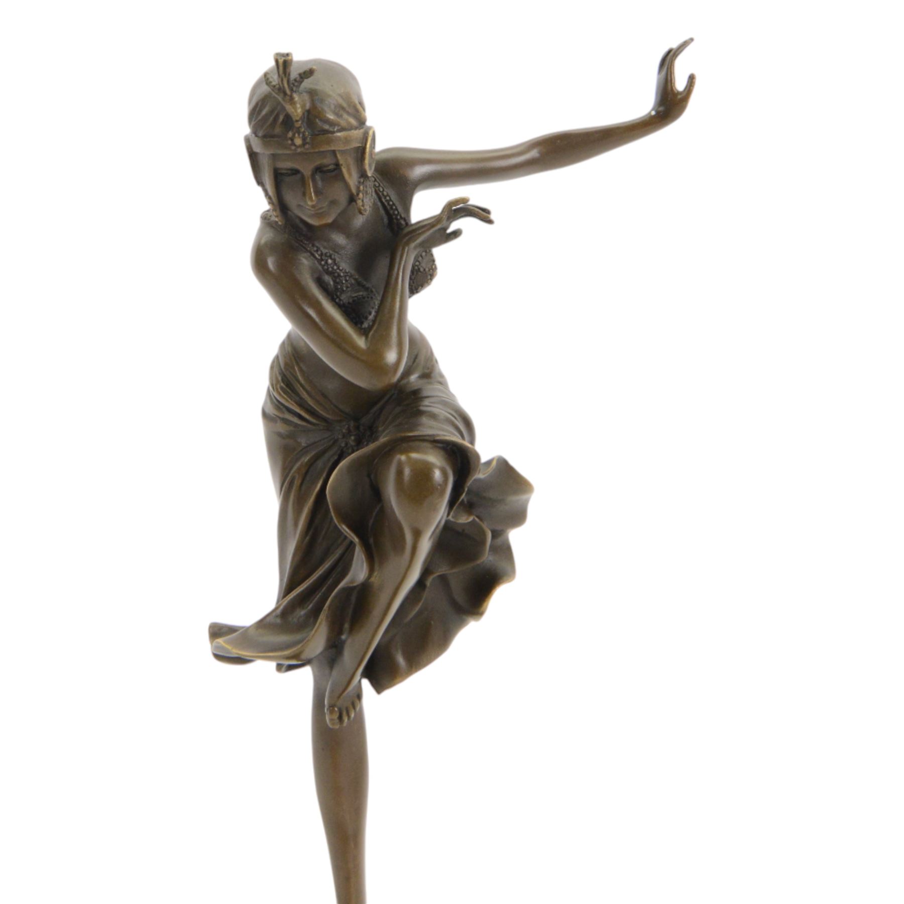 After Dimetri H Chiparus; Art Deco style bronze, modelled as a dancing flapper girl, upon black marble socle base, overall H40cm