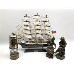 Wooden model of the Cutty Sark, together with miners lamp detailed 'Faraday Lecture 1979/80 National Coal Board Power Below', and two bronzed figured modelled as male and female figures