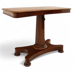 William IV mahogany reading table, the rectangular top with rounded corners and moulded edge, one end fitted with two hinged adjustable reading slops with two rests, the sliding top with a sprung stay mechanism, supported on a single tapered faceted column  with turned collar on a quatreform base with compressed bun feet