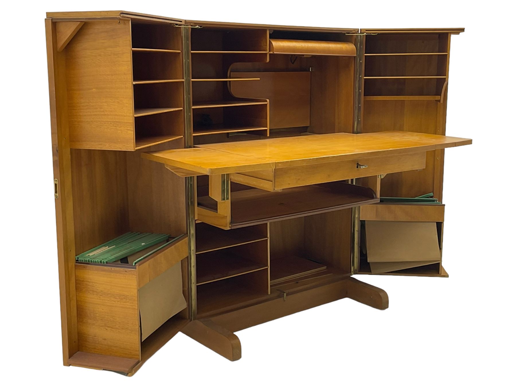 Mid-20th century walnut 'Magic Box' design metamorphic desk cabinet, two doors open to reveal sliding desk with drop leaves, document divisions and internal lamp, on sledge supports 