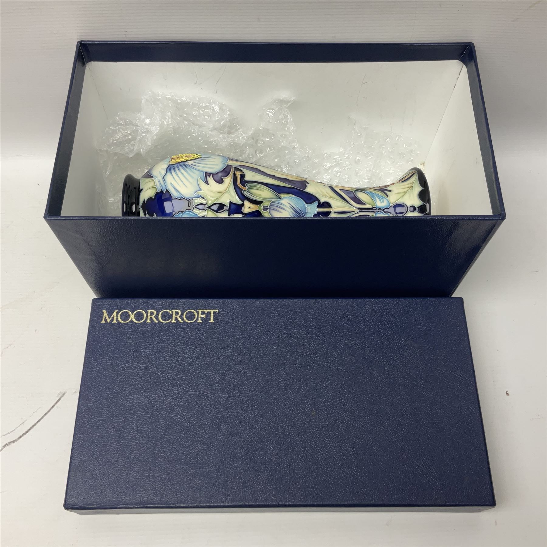 Moorcroft Collectors Club vase, of inverted baluster form, decorated in the Meconopsis pattern by Rachel Bishop, circa 2004, limited edition no. 14/150, H27.5cm, with original box