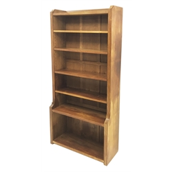 'Mouseman' oak bookcase, four adjustable shelves by Robert Thompson of Kilburn, W84cm, H183cm, D32cm