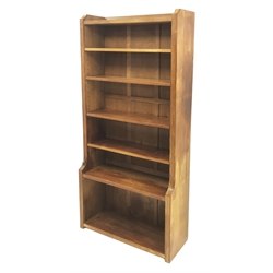 'Mouseman' oak bookcase, four adjustable
