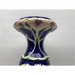  Art Nouveau style jardinere and stand decorated with flowers and foliage on a blue ground, H94cm 