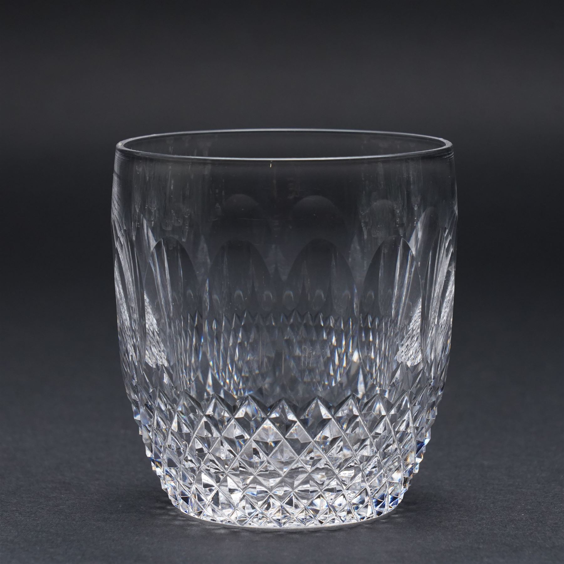 Suite of Waterford Colleen pattern table glass comprising six claret glasses, six hock glasses, six small tumblers, six sherry glasses and two decanters