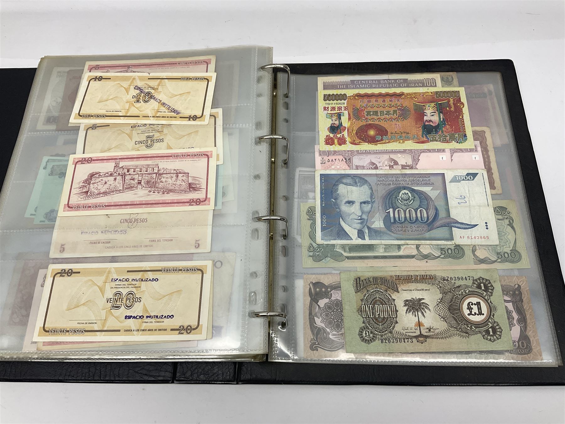 World and Great British banknotes to include Brazil, Canada, France, Germany, Ghana, Indonesia, Iraq, Hong Kong, Hungary, Japan, Vietnam, Zimbabwe, a collection of Chinese ‘Hell Money’, and quantity of ‘De La Rue Systems’ test notes, housed in ring binder and loose