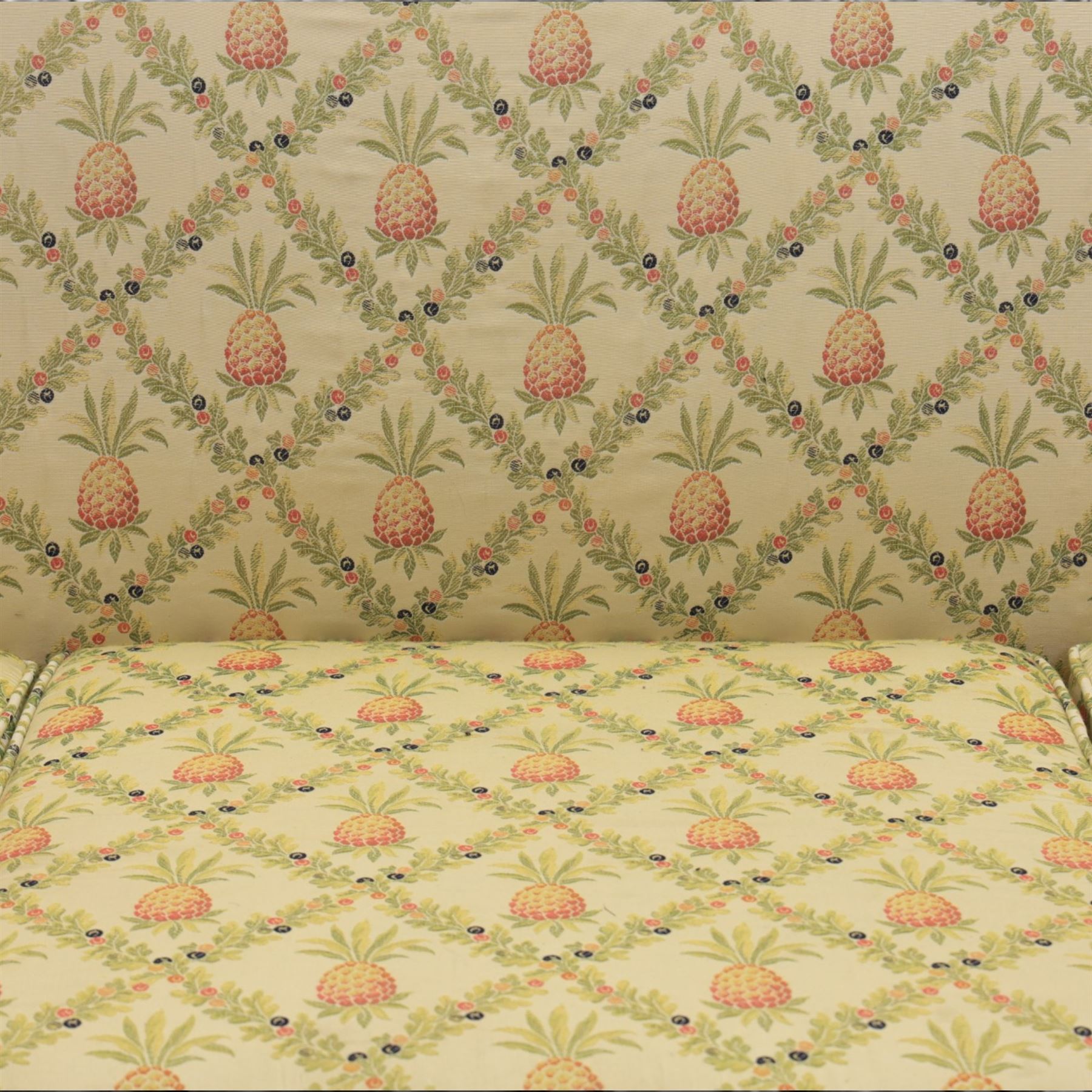 Louis XV design giltwood framed settee, the frame with applied foliate detail,  three loose seat cushions, upholstered in pineapple patterned fabric