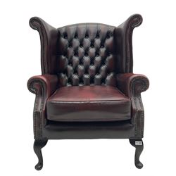 Thomas Lloyd - Georgian style wing back armchair, upholstered in buttoned oxblood leather