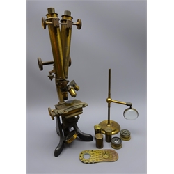  Late 19th century brass binocular microscope, with rack and pinion coarse and fine adjust E.Leitz 1, J.Swift 1/6 and 3in objective lenses, swivel adjustable stage with Frog plate, on black japanned horseshoe base, H48cm, with free-standing bullseye condenser lens, H28cm   