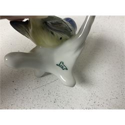 Seven Karl Ens bird figures, including barn owl, eagle owl, blue tit, budgerigar etc, all with mark beneath, tallest H17cm 