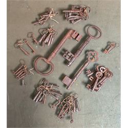 Collection of antique keys, including two large examples. Largest L21cm