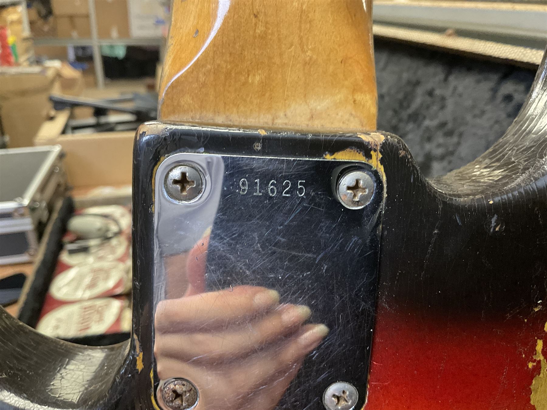 Early 1960s American Fender Precision electric bass guitar with original three-tone sunburst finish and faux tortoiseshell scratch plate; rosewood fretboard; all original fittings including chromium plated bridge and pick-up covers, finger rest, 'pots' and machines, dated on end of neck 5NOV62C, serial no.91625; L115cm overall; in Selmer simulated reptile skin covered carrying case. Sold with non-transferrable CITES A10 licence, certificate no.23GBA10CNKKEB, serial no.441200, dated 30th August 2023. Also included are original 1960s photographs of the band 'The Rascals' and photocopies of newspaper cuttings advertising their forthcoming performances along with a photocopy of a photograph of their television appearance on 'Opportunity Knocks' in 1967/8 (coming second to Mary Hopkins). In addition there is a reel-to-reel tape recording and USB stick of the band playing and two sheets of biographical information. Auctioneer's Note: The guitar was ordered by Trevor Parker from Pat Cornell's Music Shop, Spring Bank, Hull and imported from the USA in 1962, well before it was available in the UK. Trevor was the bass guitarist of The Rascals from Hull, later The Ides of March, who supported artists such as Elton John on the Hull circuit. Trevor played the guitar extensively until 1969 when The Rascals disbanded, he got married to Maureen and settled down to family life. Trevor sadly passed away in 2017, and after being in store for fifty-four years his widow has decided it is time for his guitar to be sold.