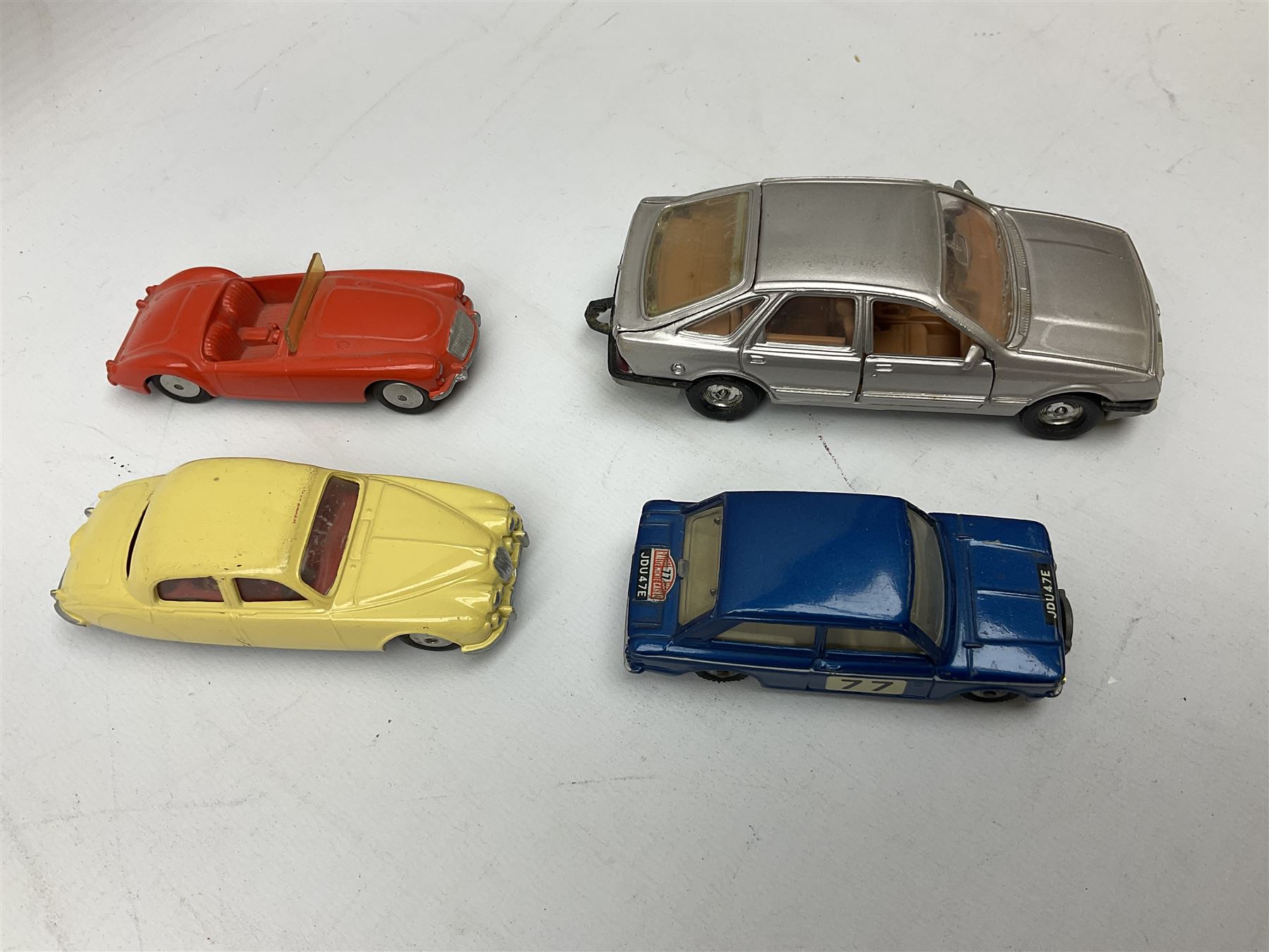 Corgi - thirty unboxed and playworn/repainted die-cast cars including Triumph Herald Coupe, BMC Mini-Cooper 'S', Porsche Carrera, two 'E' Type Jaguars, Rover 2000TC, three Morris Minors, two Aston Martin DB4, two Volvo P1800, MGA, Fiat 2100, Jaguar 2.4 Litre, Jaguar Mark X Saloon etc (30)